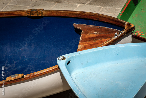 Fotomural Small Rowing Boats on the Quay of the Harbor - Liguria Italy