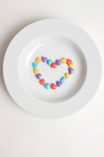 Heart Shaped Colorful Candies On Plate