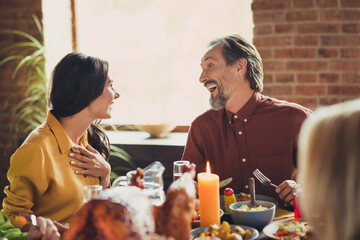 Photo of family thanks giving meeting served full dishes table greeting dinner young couple communicating living room indoors