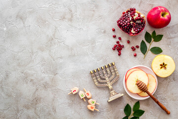 Wall Mural - Jewish cuisine for rosh hashana holiday - apple honey and pomegranate, top view