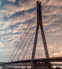 Morning view on the cable stayed bridge and ancient buildings of old European city