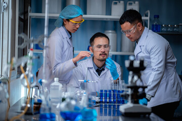 Wall Mural - the teamwork specialist scientis or reseacher test and develope the drug chemical vaccine experiment