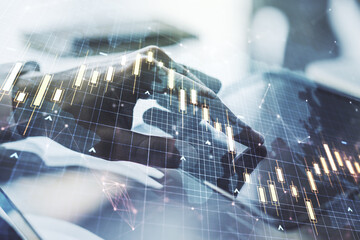 Poster - Multi exposure of abstract creative financial chart with world map and with finger presses on a digital tablet on background, research and analytics concept