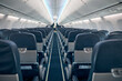 © Svitlana - Airline passenger chairs and aisle in airplane cabin