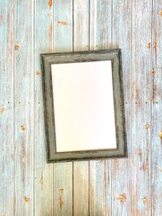 old photo frame on wooden background