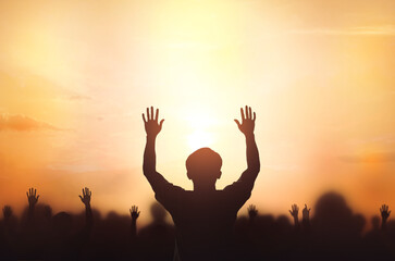 Canvas Print - Worship concept:  christian people Raise hand over  cross on spiritual sky background