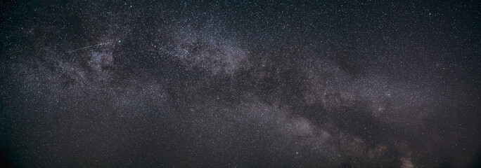 real night sky stars with milky way galaxy. natural starry sky background. panorama panoramic view