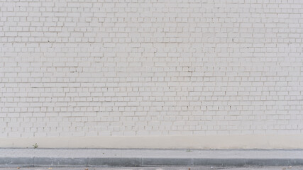 soft light white brick wall facade exterior at city street outdoor