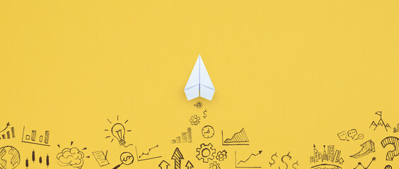 Wall Mural - Business success, innovation and solution concept, Paper plane and business strategy on yellow background