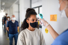 People With Face Masks, Coronavirus, Covid-19, Measuring Temperature And Vaccination Concept.
