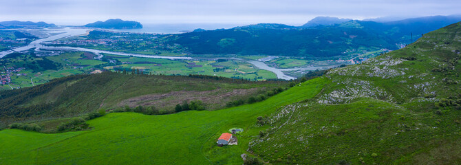 Wall Mural - View from Pico Candiano. In the background the Rada and Limpias marshes and the Treto estuary and Monte Buciero. Marismas de Santoña Natural Park. Cantabria. Spain, Europe