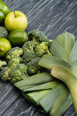 Wall Mural - fresh green ripe fruits and vegetables on wooden surface