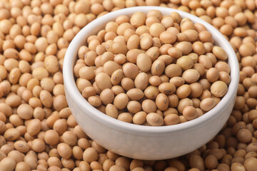 Wall Mural - Dry organic soybeans in ceramic bowl