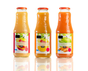 Wall Mural - Juice in a glass bottle, bright colored drink on a white background isolated