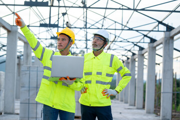 Aufkleber - Engineer using laptop working on building site,Construction concept.