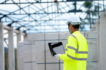 Aufkleber - Engineer using laptop working on building site,Construction concept.
