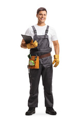 Sticker - Full length portrait of a male worker with a tool belt holding a clipboard