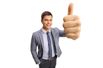 Poster - Professional young man showing thumbs up in front of the camera