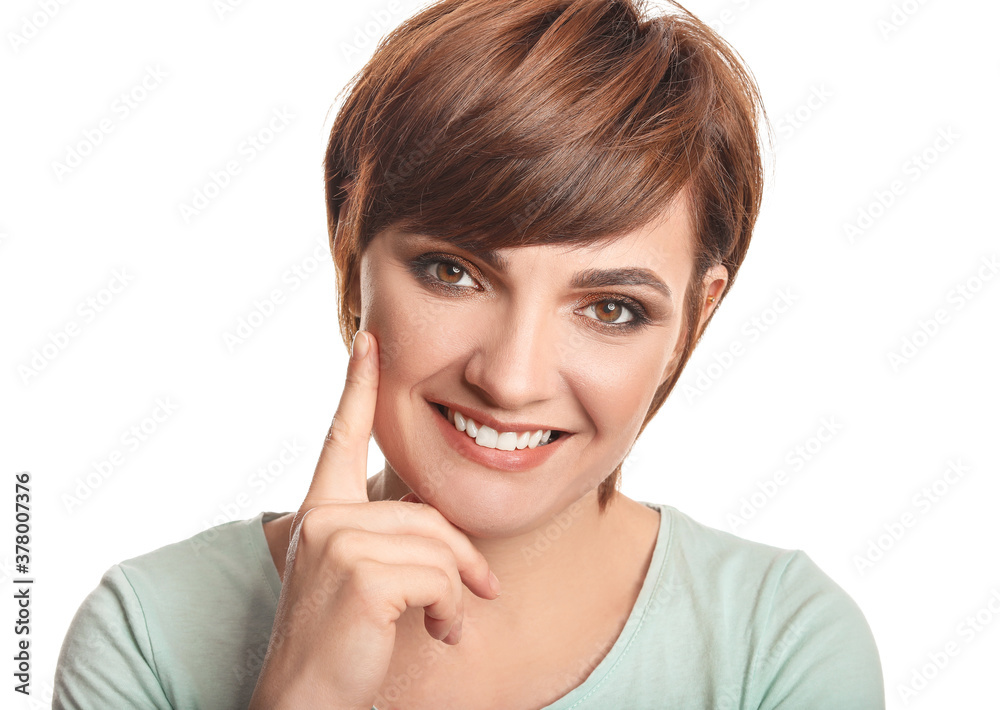 Young woman with beautiful short hair on white background
