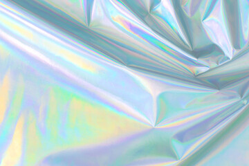 Fototapete - Abstract Modern pastel colored holographic background in 80s style. Crumpled iridescent foil textile real texture. Synthwave. Vaporwave style. Retrowave, retro futurism, webpunk