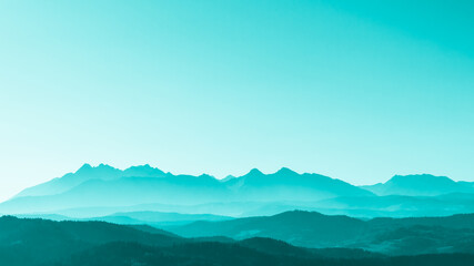 green surreal mountains against the backdrop of a turquoise sky, fantastic fairytale mountain landsc