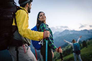 group of friends on a hiking, camping trip in the mountains
