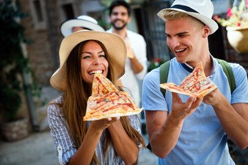 Happy group of friends enjoying traveling and vacation