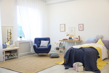 Poster - Modern teenager's room interior with bed and armchair