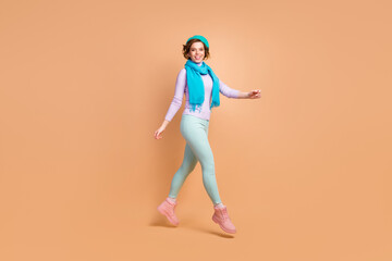 Sticker - Full length body size view of her she nice attractive lovely pretty charming cheerful cheery girl jumping walking wearing modern mint lavender garment isolated over beige pastel color background