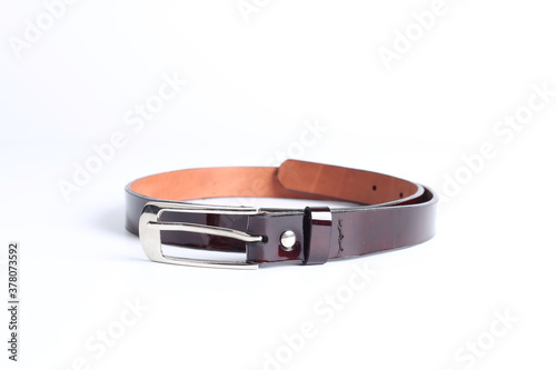 Cuadros en Lienzo Brown belt on a white background.