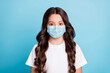 © deagreez - Close-up portrait of her she nice attractive lovely cute girl safe from corona virus outbreak wear medical mask isolated over bright vivid shine vibrant blue teal turquoise color background