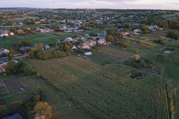 Top view of the village in the rays of the setting sun