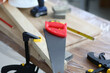 © megaflopp - Workbench with wooden blocks and carpentry tools