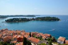 Panoramic View Of Rovinj Croatia Old Town With Blue Sea And Red Island 