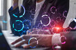 © VideoFlow - Two businesswomen working together in office. Abstract tech icons holographic illustration double exposure.