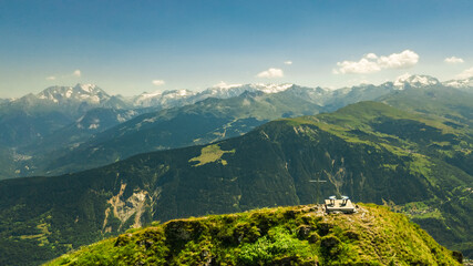 Poster - Panoramic drone view of the mountain peak called Creve-Tete in the french Alps Valmorel France