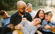 © Erin Drago Photography/Stocksy - Happy Family Laughing Together