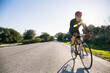 © Inuk Studio/Stocksy - Man riding a bicycle in Madrid, Spain