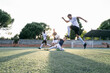 © Inuk Studio/Stocksy - Football players playing on field
