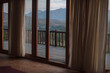 © ZHPH Production by Artem Zhushman/Stocksy - View from house window on nature