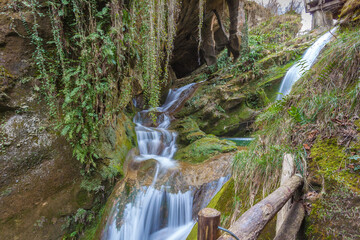 Series of waterfalls in caves carved out of sandstone, Caglieron caves, Veneto, Italy