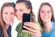 © danmorgan12 - Youth Lifestyle Concept. Three Beautiful Caucasian Ladies Taking Selfie Photos With Smartphone.