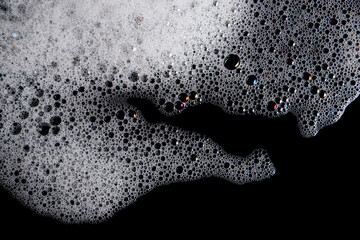 Wall Mural - Abstract background white soapy foam texture. Shampoo foam with bubbles