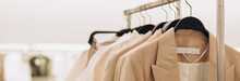 Banner For Women's Clothing Store In Beige Colors. Selective Focus, Copy Space