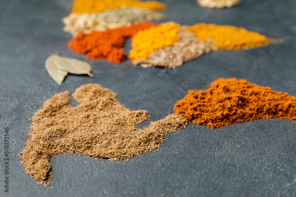 World map made of different spices on grey background