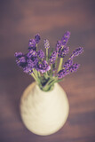 Fototapeta Lawenda - Fresh flowers of lavender bouquet on rustic wooden background