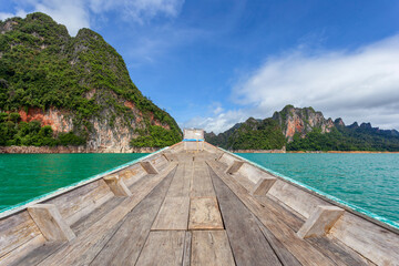 Wall Mural - Beautiful mountains lake river sky and natural attractions in Ratchaprapha Dam at Khao Sok National Park