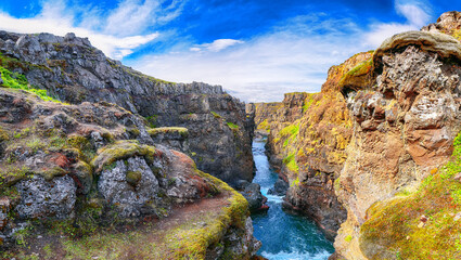 Wall Mural - Spectacular view of  Kolugljufur canyon and Kolufossar falls.