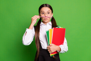 Poster - Photo of lovely pretty small lady in front of blackboard hold stack copybook funky look playing hold pen mustachio pouted lips wear white shirt glasses isolated green color background