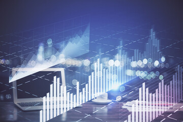 Forex Chart hologram on table with computer background. Multi exposure. Concept of financial markets.